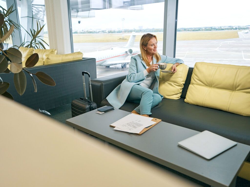 Traveler relaxing in airport lounge